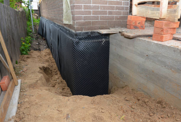 SJ Waterproofing Pros technician performing targeted Waterproofing assessment in Brant, NY